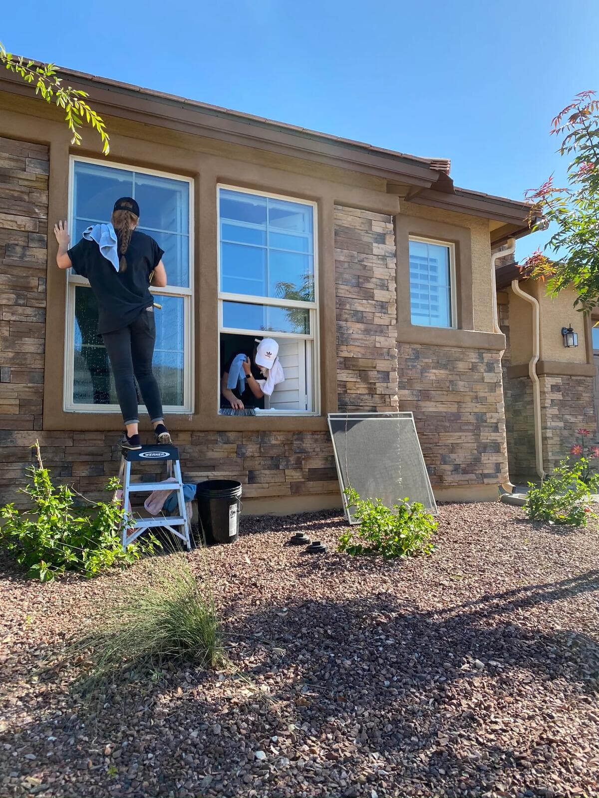 AZ Window Shine team cleaning exterior windows